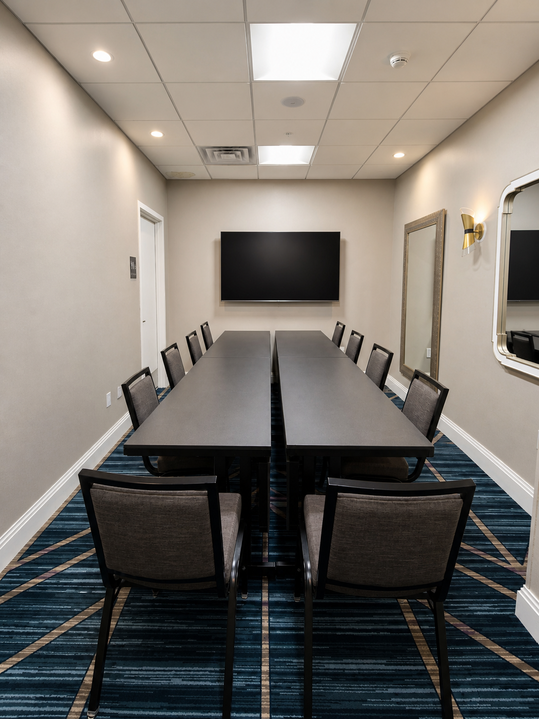 Flexible boardroom arranged for a private group meeting